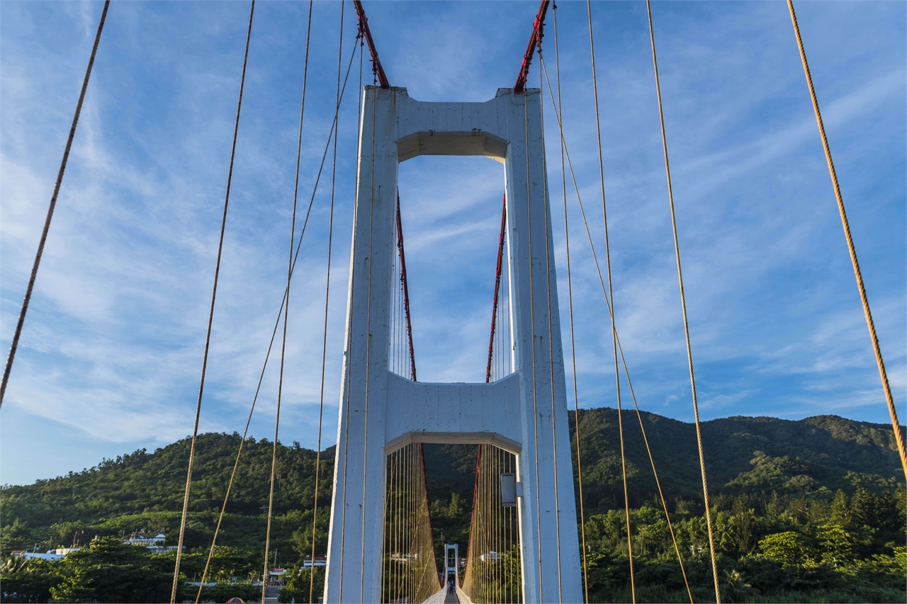 A red-and-white bridge