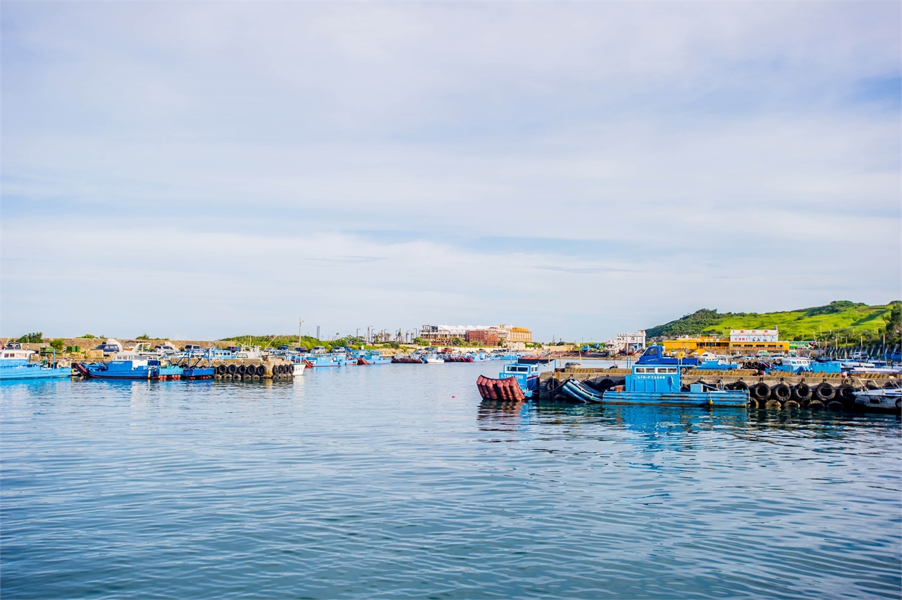 Boats resting at a fishery port